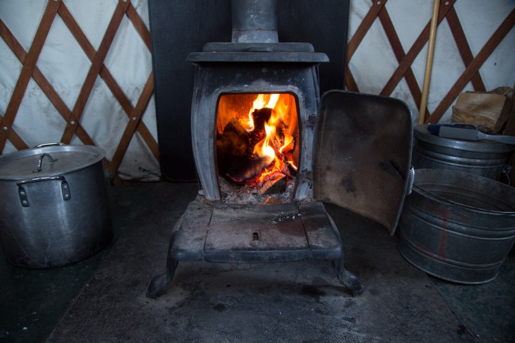 Wood stove in yurt
