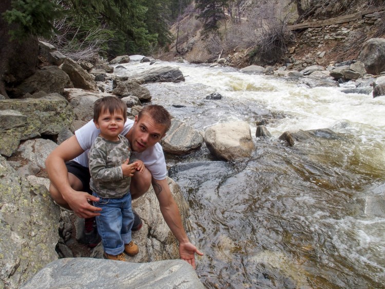 Peter and Kion splashing in the water
