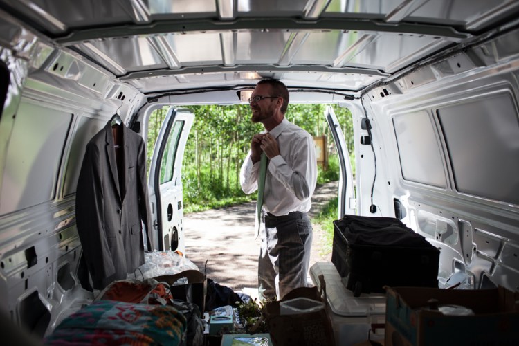 Chris getting ready in the cargo van (photo by Kent Meireis)