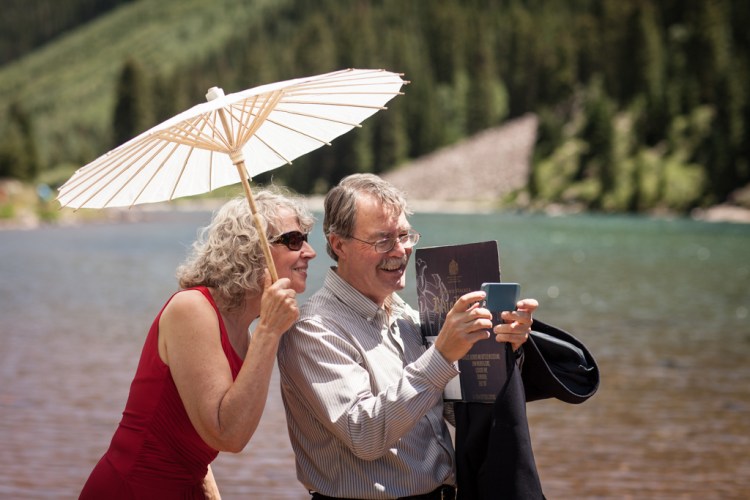 Chris's parents snapping photos (photo by Kent Meireis)